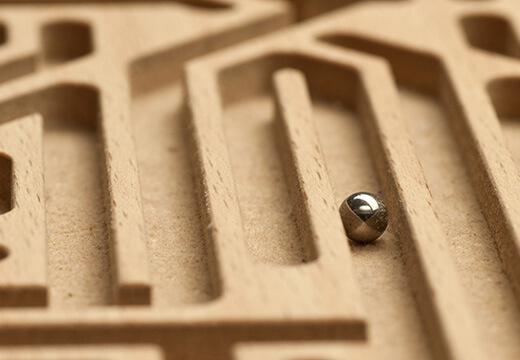 Symbolic photo for Commissioned Research: wooden labyrinth